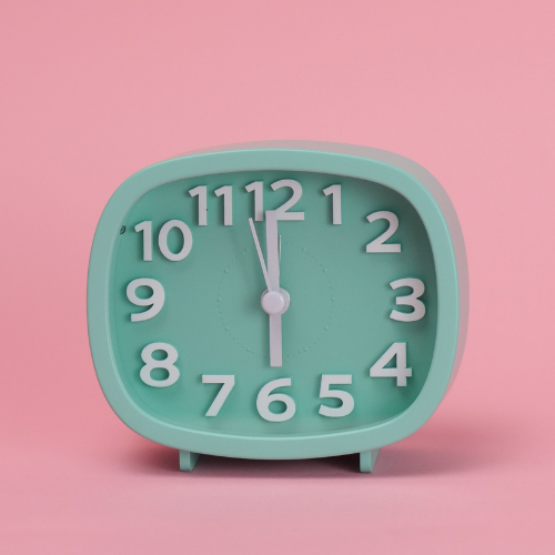 Pink background with Green Retro Clock